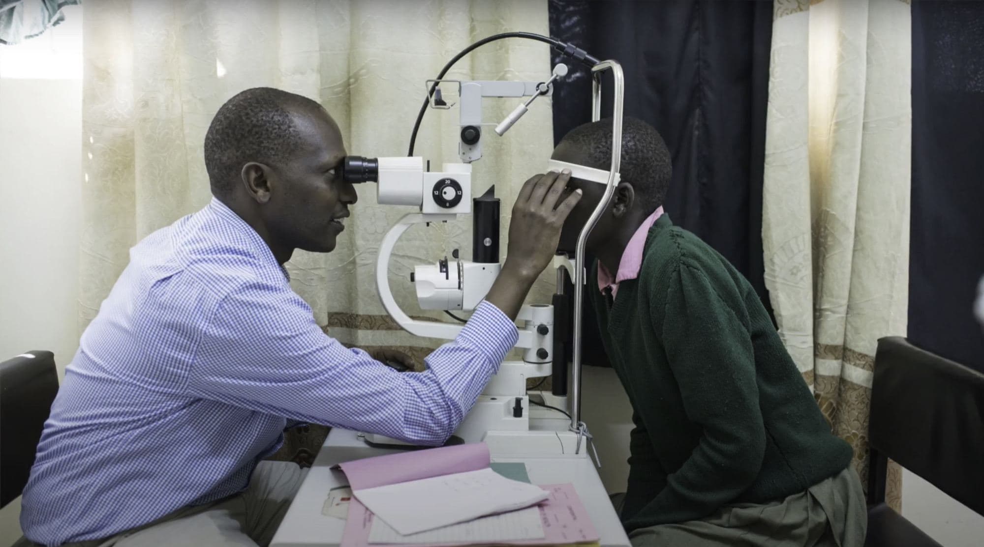 An eye examination at the Kitale eye clinic in Kenya, 2021. Not a Lions or a Leo project — it is a photograph of the work SightFirst exists to pay for.